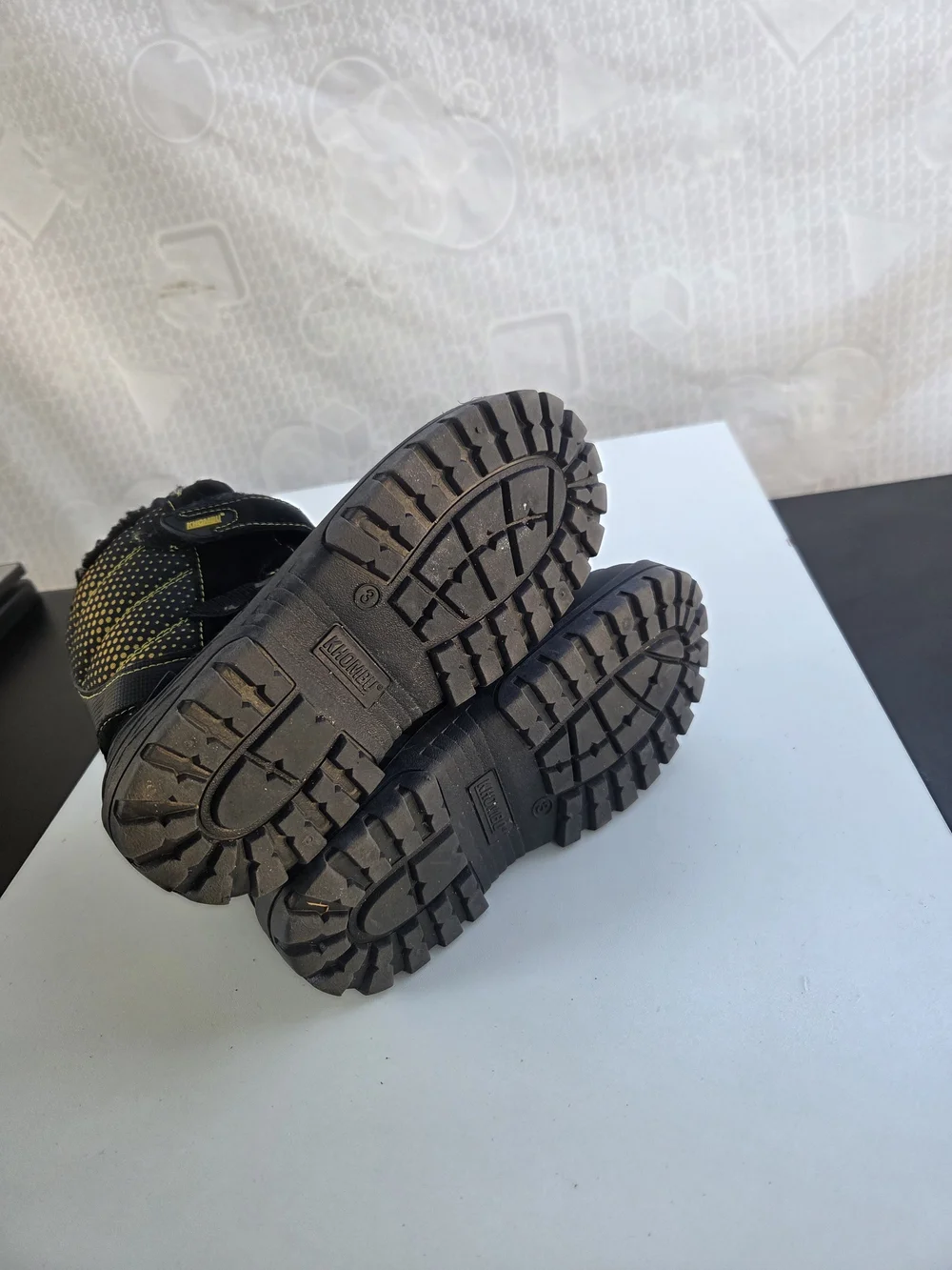 Khombu Kids Black Snow Boots with Yellow Stitching